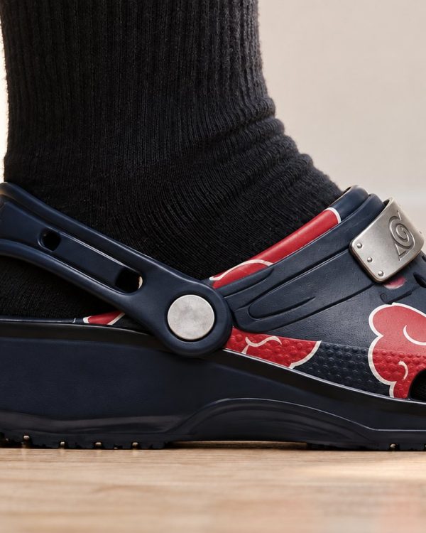 Side view of a foot wearing Akatsuki Clogs