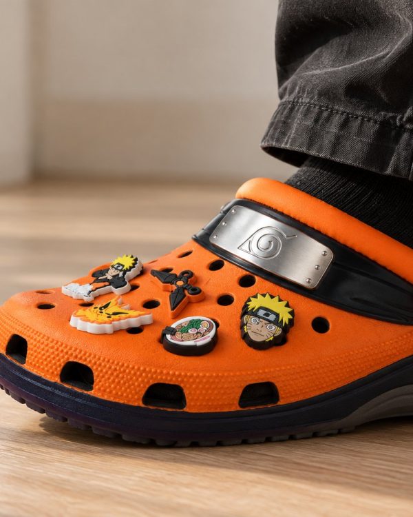 Side view of a foot wearing Naruto Clogs