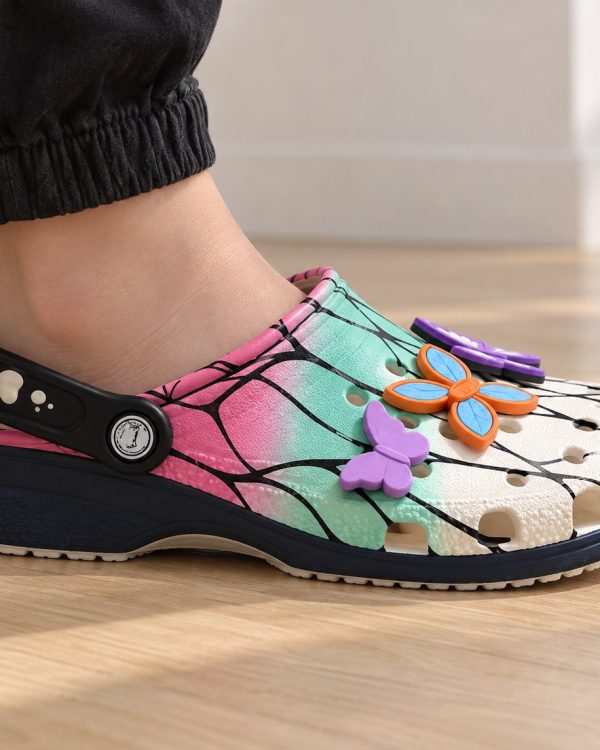 Side view of a foot wearing Shinobu Clogs